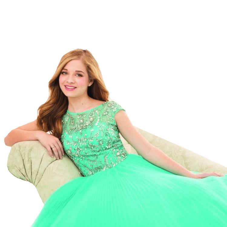 Jackie Evancho Sitting on A Sofa png transparent